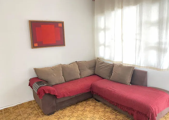 Pé na areia praia Guilhermina